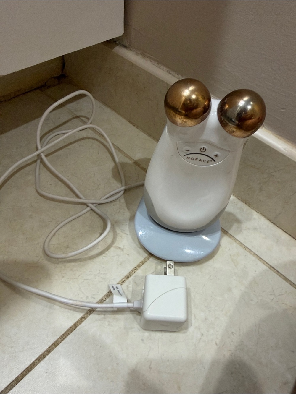 NuFace Microcurrent Facial Toning Device in White with Gold Spheres